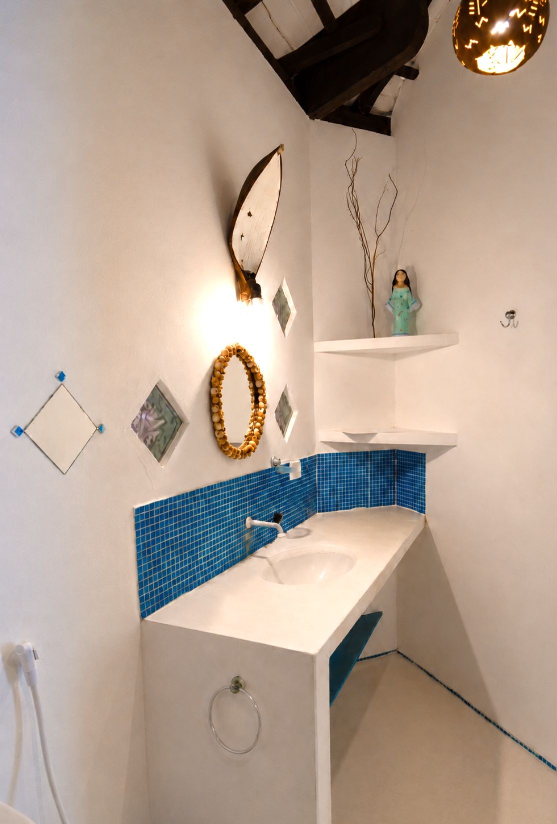 Bathroom with blue mosaic details