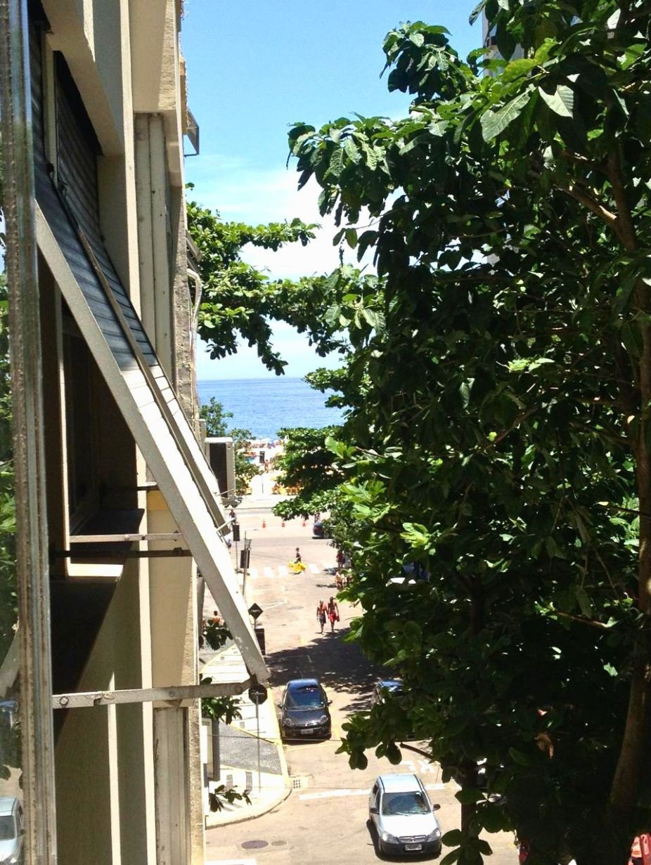 Partial beach view from Apartamento Leme on the fourth floor